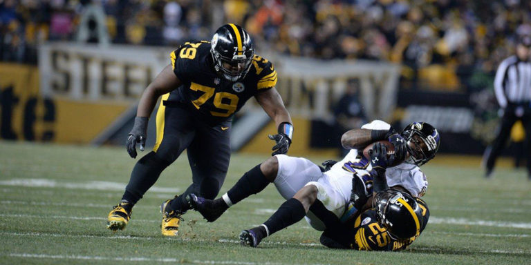 Steelers defensive tackle Javon Hargrave sacks Patriots quarterback Tom Brady