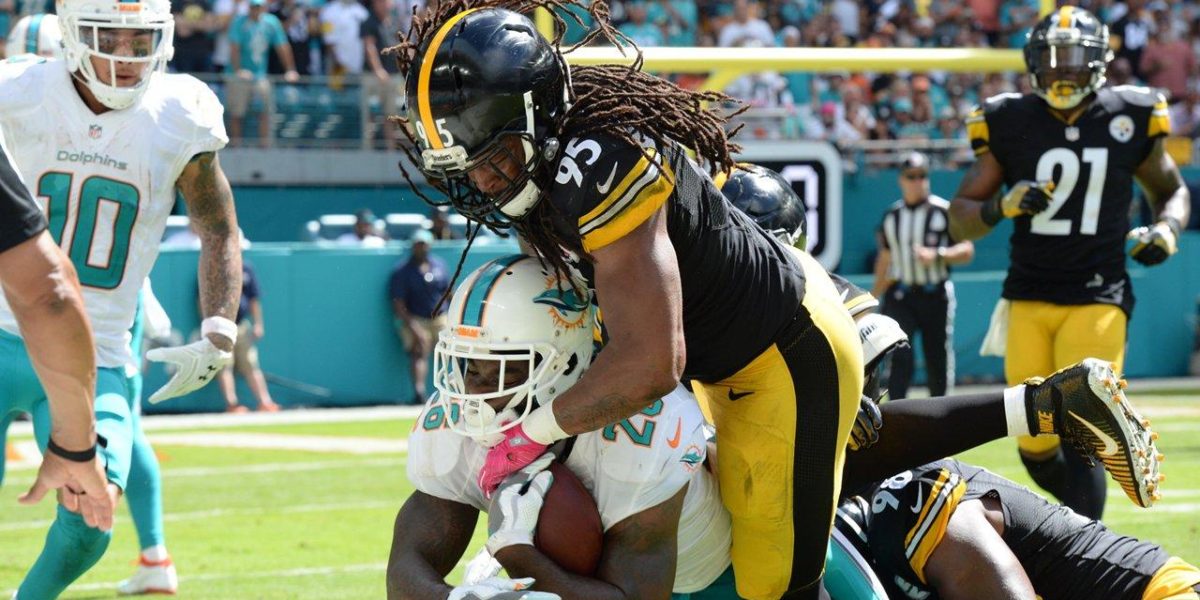 Steelers LB Jarvis Jones tackles a Miami Dolphins player