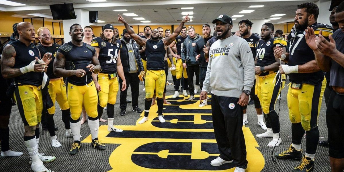 Steelers head coach Mike Tomlin addresses the team after their win over the Green Bay Packers