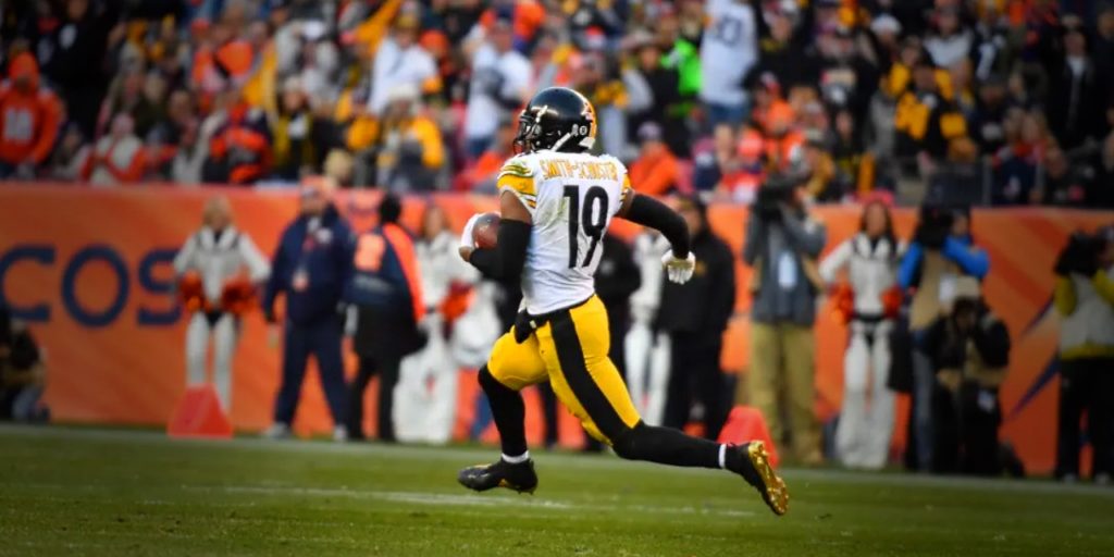 Pittsburgh Steelers receiver JuJu Smith-Schuster catches a pass and runs it for a 97-yard touchdown against the Denver Broncos (Karl Roser/Pittsburgh Steelers)