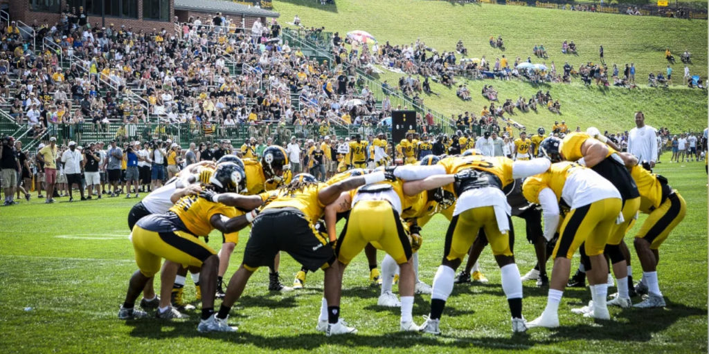 The Pittsburgh Steelers huddle at Chuck Noll Field