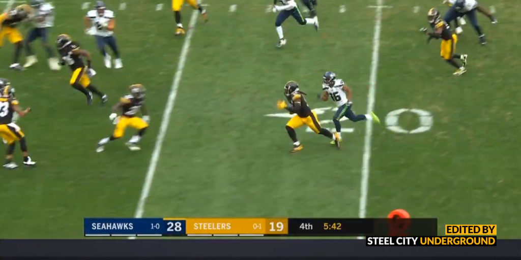 Steelers LB Devin Bush recovers a fumble against the Seattle Seahawks