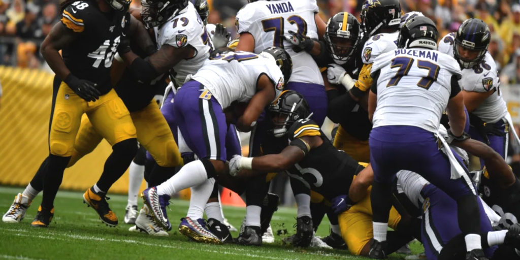 Pittsburgh Steelers rookie linebacker Devin Bush makes a tackle against the Baltimore Ravens in NFL Week 5 of the 2019 season