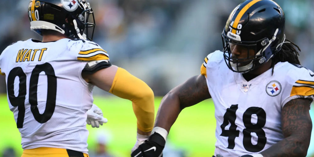 Pittsburgh Steelers linebackers Bud Dupree and T.J. Watt celebrate a play during Week 16 of the 2019 NFL regular season against the New York Jets