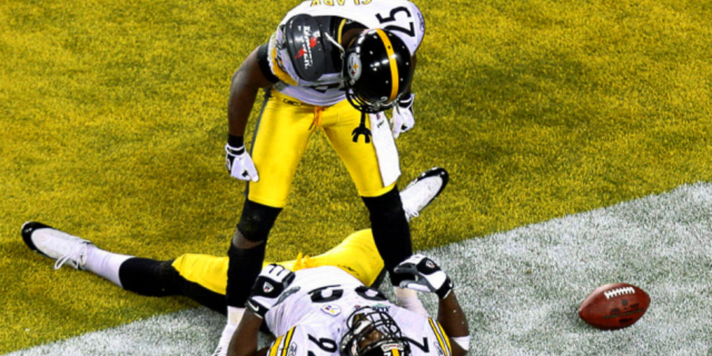 Pittsburgh Steelers defensive back Ryan Clark celebrates with teammate James Harrison