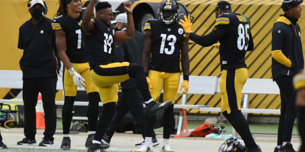 Steelers receiver JuJu Smith-Schuster celebrates a win with his teammates over the Browns