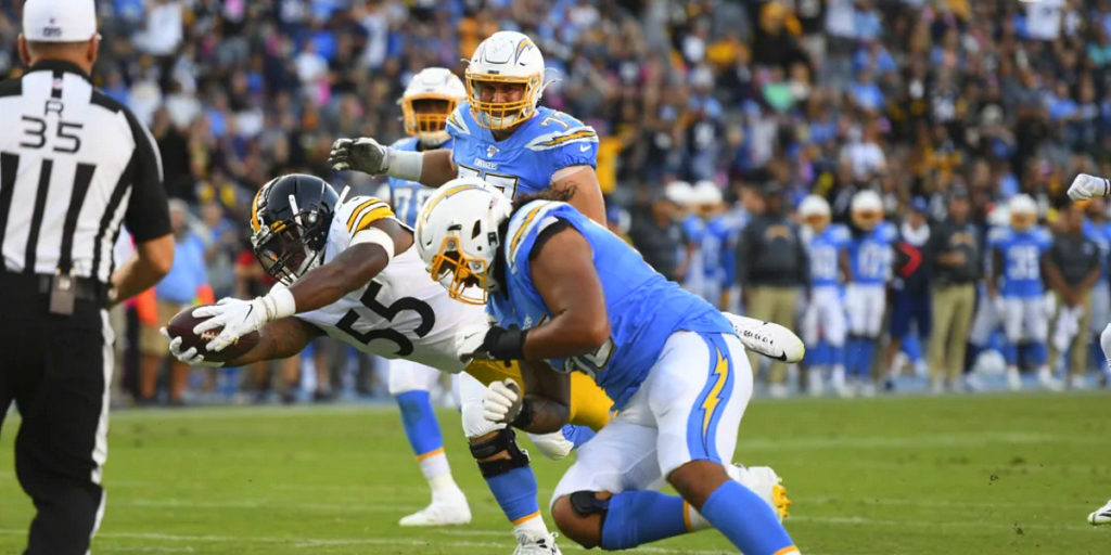 Linebacker Devin Bush Jr. of the Pittsburgh Steelers scores a touchdown