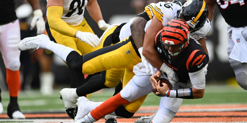 Alex Highsmith (56) of the Steelers sacks Joe Burrow (Bengals)