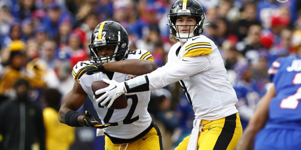 Najee Harris (22) and Kenny Pickett (8) of the Pittsburgh Steelers