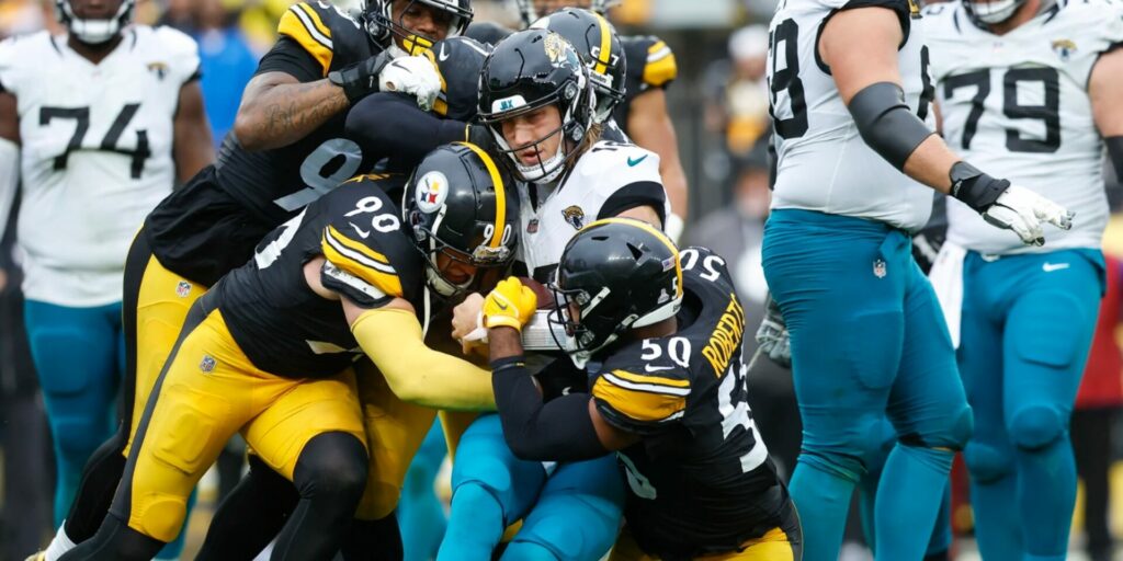 Elandon Roberts (50) and T.J. Watt (90) of the Pittsburgh Steelers