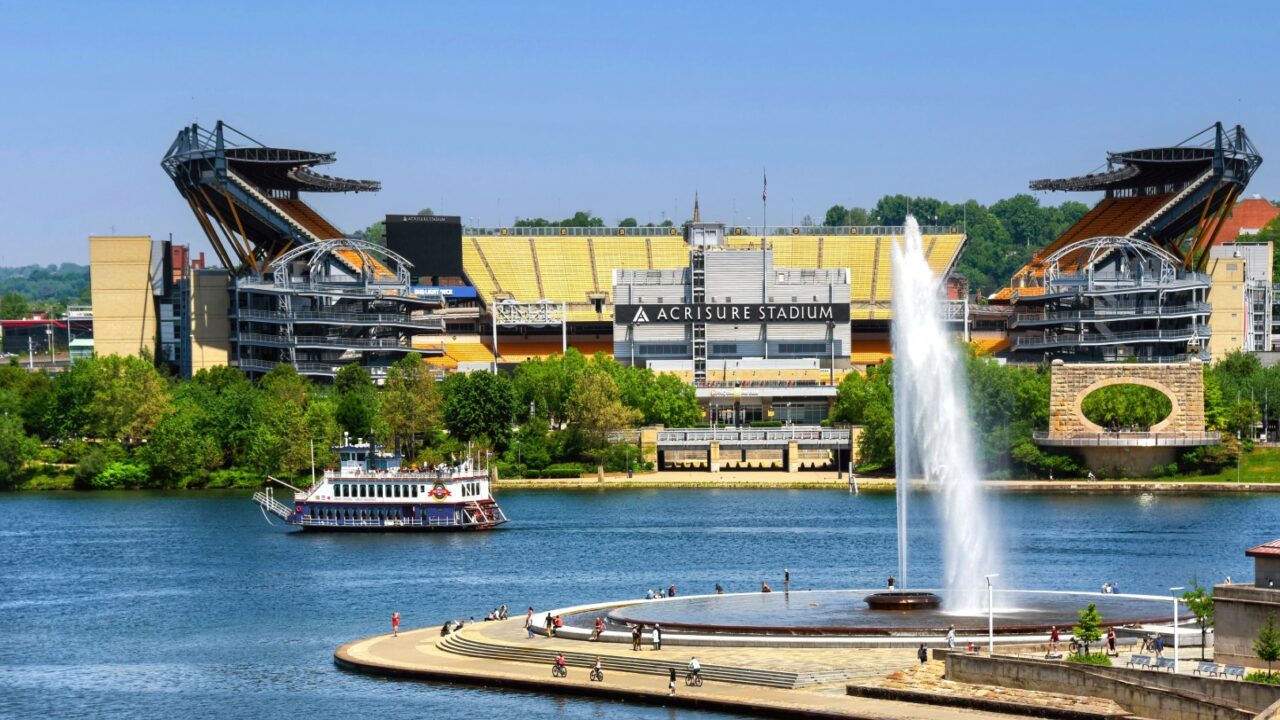 Riverboat cruise ship Princess passes between Acrisure Stadium, home of the Pittsburgh Steelers